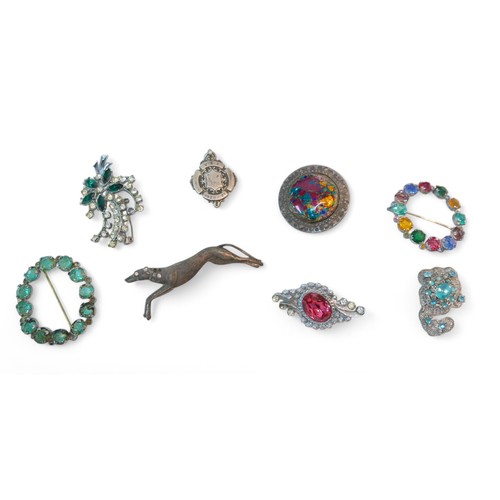 55 - A collection of costume jewellery, including necklaces, brooches, as well as a silver fob, 0.2toz, a... 