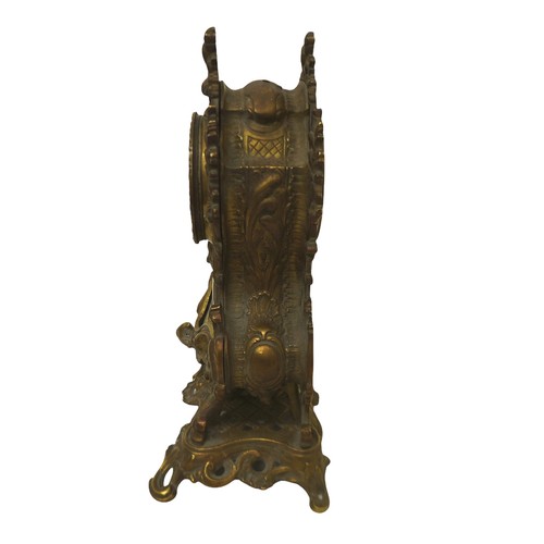 215 - A French 19th century gilt brass mantel clock, the case with inset painted porcelain plaques, 8-day ... 