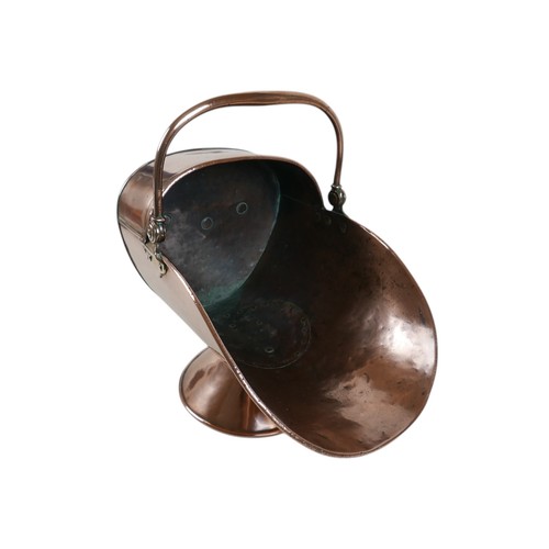 229 - A Victorian copper and brass helmet coal scuttle, 44 by 30 by 35cm high.