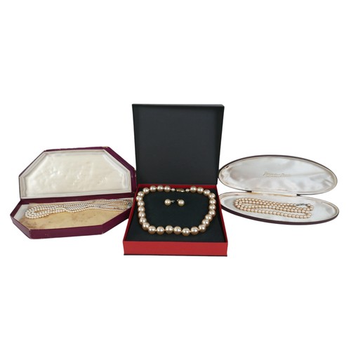 62 - A collection of costume jewellery, including a pair of 9ct yellow gold earrings, each set with an ov... 