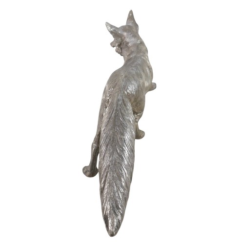 1 - A large hollow cast silver sculpture, modelled as a fox, Carrington & Co, London 1974, 49 by 12 by 1... 