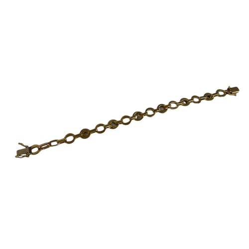 110 - An 18ct yellow gold diamond bracelet, the chain link bracelet set with six diamonds graduating in si... 