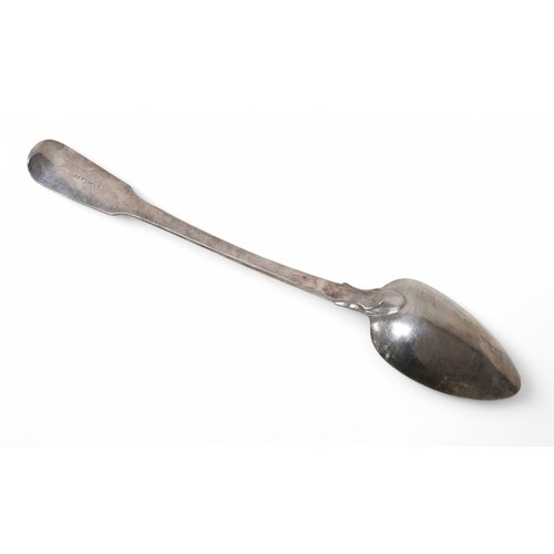 17 - A George III silver fiddle back pattern serving spoon, rubbed maker's mark, London 1820, 30cm long, ... 