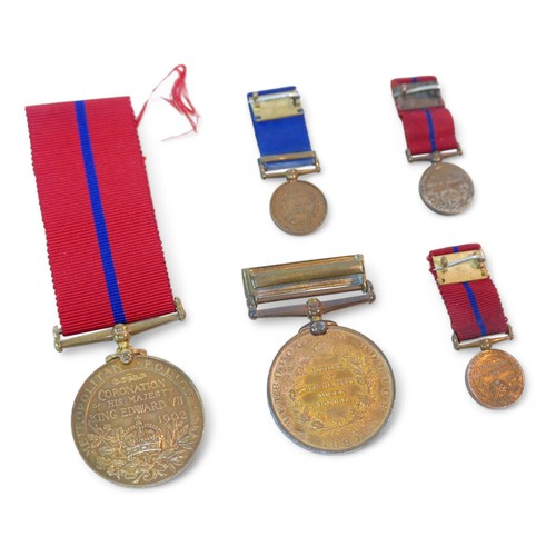 183 - A collection of Victorian and later Metropolitan Police Royal commemorative medals, an 1897 Queen Vi... 