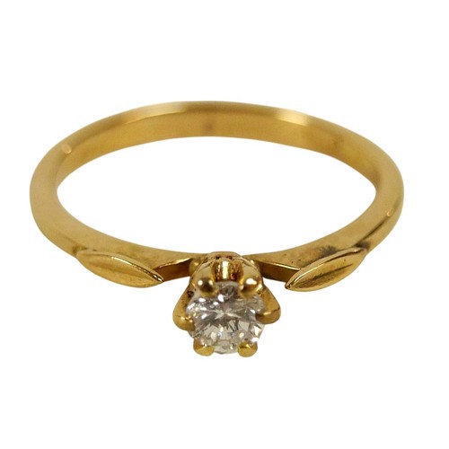 87 - An 18ct yellow gold and diamond solitaire ring, the round cut stone, 3.5 by 2.5mm, 0.17ct, in six cl... 