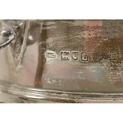 30 - A George V silver trophy cup, with twin handles, unengraved, Skinner & Co, London 1914, 28 by 18.5 b... 