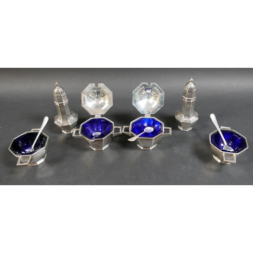 22 - An Elizabeth II silver six piece cruet set, in Art Deco style with octagonal section design, compris... 