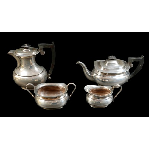 36 - A George VI silver four piece tea service, London shape, comprising coffee pot, 22cm high, teapot, 1... 