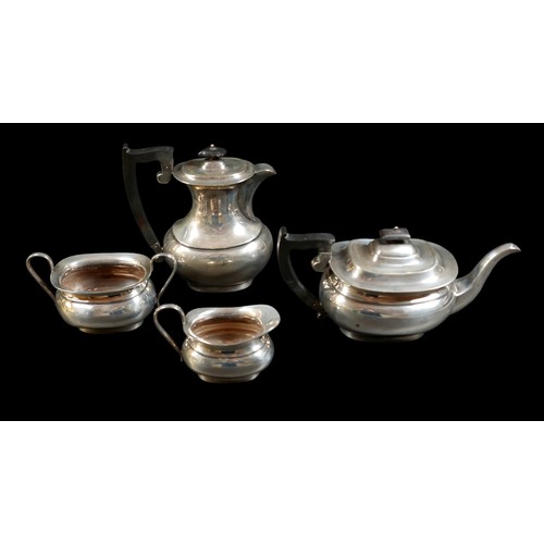 36 - A George VI silver four piece tea service, London shape, comprising coffee pot, 22cm high, teapot, 1... 