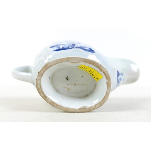 137 - An 18th century Lowestoft porcelain small sauce boat, decorated with moulded exterior and in undergl... 