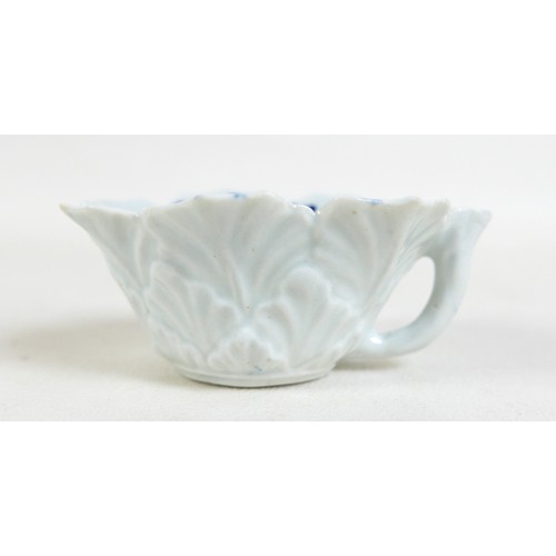 141 - A group of 18th century blue and white porcelain, comprising a Worcester butter boat, circa 1760, re... 