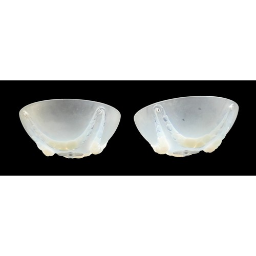 162 - A pair of Art Deco Lalique opalescent moulded glass plafonniers, in the 'Villeneuve' pattern, No. 24... 