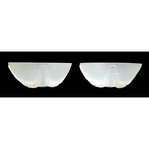 162 - A pair of Art Deco Lalique opalescent moulded glass plafonniers, in the 'Villeneuve' pattern, No. 24... 