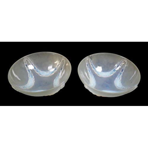 162 - A pair of Art Deco Lalique opalescent moulded glass plafonniers, in the 'Villeneuve' pattern, No. 24... 