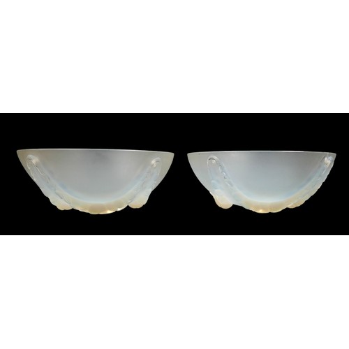 162 - A pair of Art Deco Lalique opalescent moulded glass plafonniers, in the 'Villeneuve' pattern, No. 24... 