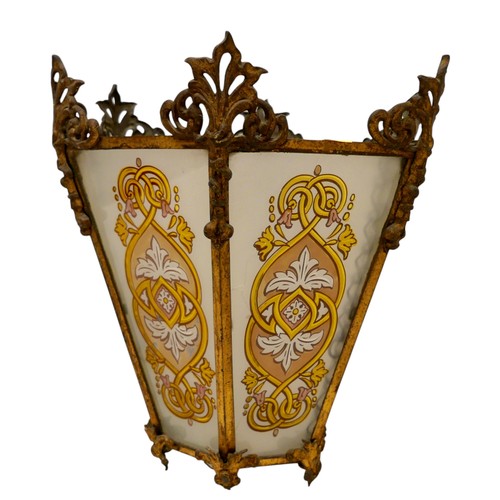 231 - A hexagonal brass lantern shade with hand painted glass panels, 33 by 32cm high, plus a brass column... 