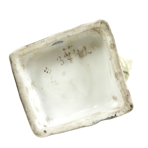 232 - A group of four porcelain Oriental figurines; a Hochst style Chinese lady carrying her wares, with c... 