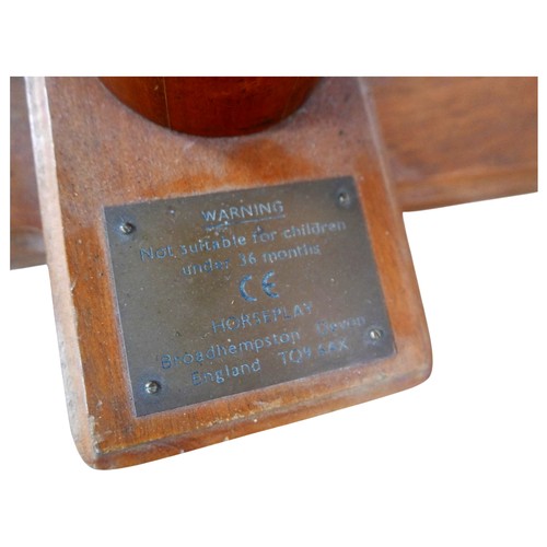 226 - A piebald wooden rocking horse by Horseplay with leather saddle and tack, 127 by 45 by 120cm high.