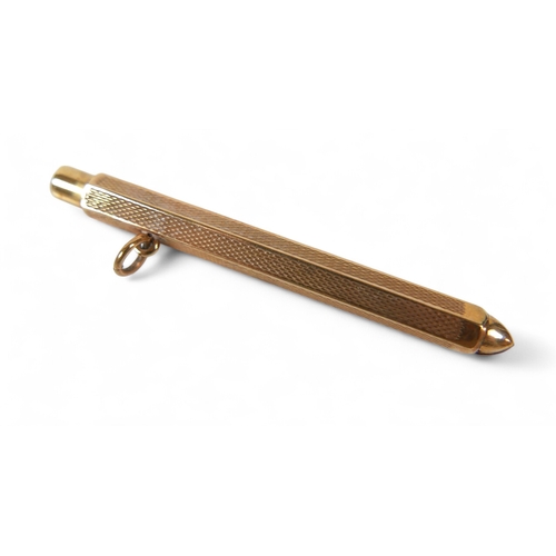 24 - A 9ct yellow gold toothpick, with sprung release, loop attachment, and engine turned decoration, C&S... 
