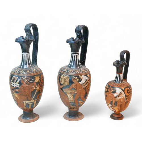 271 - Three Attic style terracotta red figure oinochoai, largest oinochoe, 12 by 36cm high, smallest, 10 b...
