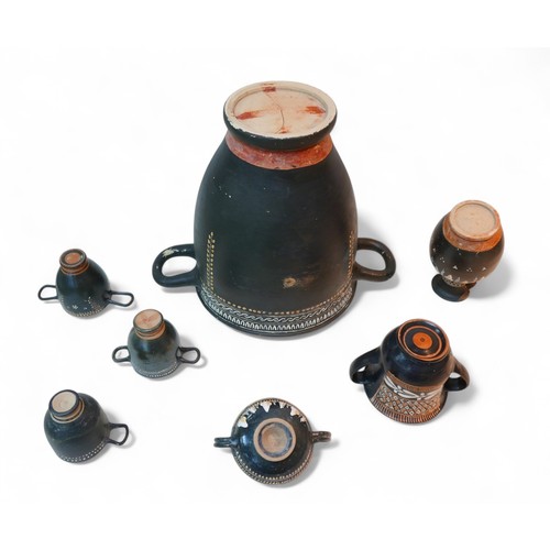 266 - Seven pieces of Attic style terracotta pottery, all with Kerch style decoration, including a bell kr... 