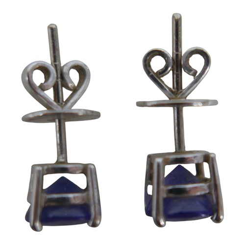 11 - A pair of 18ct white gold tanzanite earrings, each stone approximately 7mm diameter, 3.6g overall, w... 