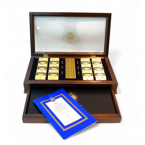 273 - A Franklin Mint cased set of 'The Faberge Imperial Dominoes by the House of Faberge', with twenty-ei... 