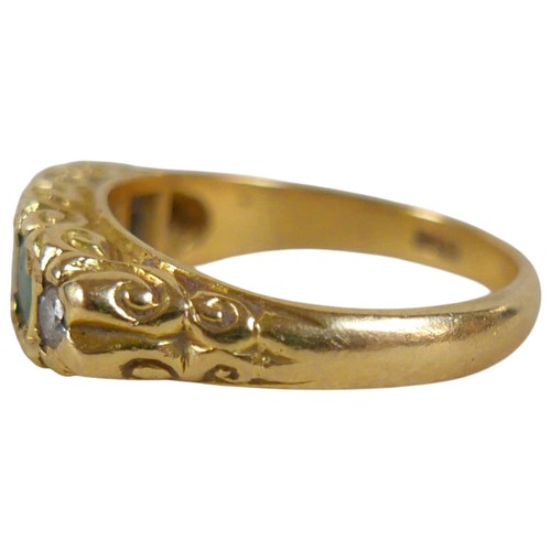 5 - An 18ct yellow gold five stone emerald and diamond ring the central diamond approximately 0.25ct, ri... 