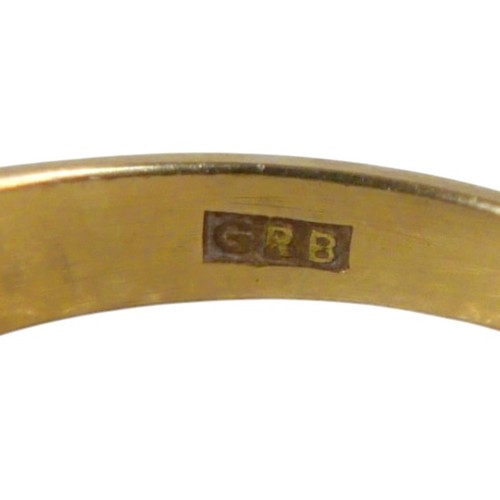 5 - An 18ct yellow gold five stone emerald and diamond ring the central diamond approximately 0.25ct, ri... 