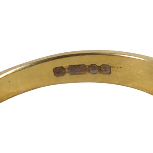 5 - An 18ct yellow gold five stone emerald and diamond ring the central diamond approximately 0.25ct, ri... 