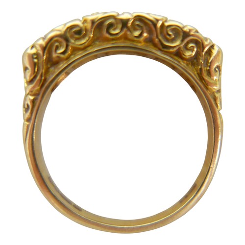 5 - An 18ct yellow gold five stone emerald and diamond ring the central diamond approximately 0.25ct, ri... 