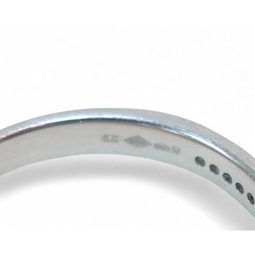 49 - A platinum and diamond half eternity ring, each stone approximately 1mm diameter, size O, 3.3g.