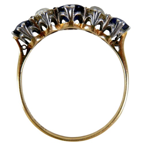 4 - An 18ct yellow gold and platinum five stone diamond and sapphire ring, the central oval cut sapphire... 