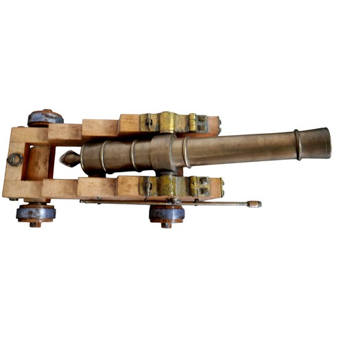 353 - A pair of engineer made 10 bore brass signal cannons on oak carriages, with tapering barrels divided... 