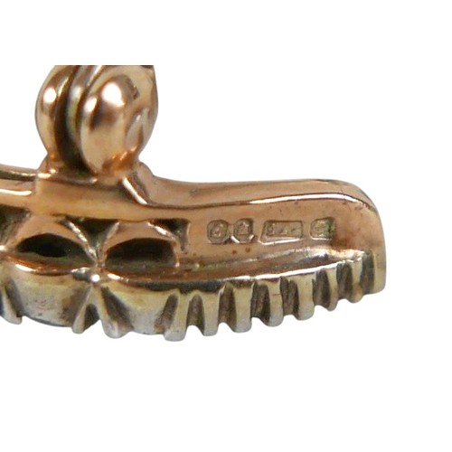 51 - A Victorian 9ct gold and diamond crescent shaped brooch, set with fifteen graduated diamonds, the la... 