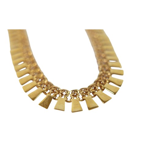 9 - An 18ct gold necklace with graduated dentil pendants, 43cm long, marked 750, 16.8g.