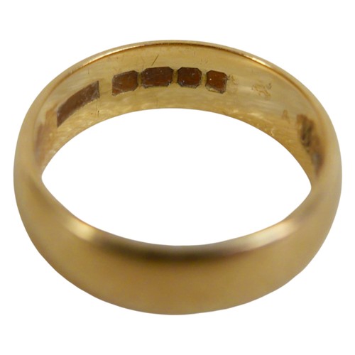 56 - A gold wedding band, size N, testing as min 9ct, marks indistinct, 5.7g