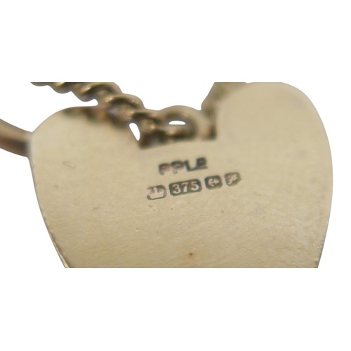 3 - A 9ct gold link bracelet with heart shaped lock, large loops, 57.7g.
