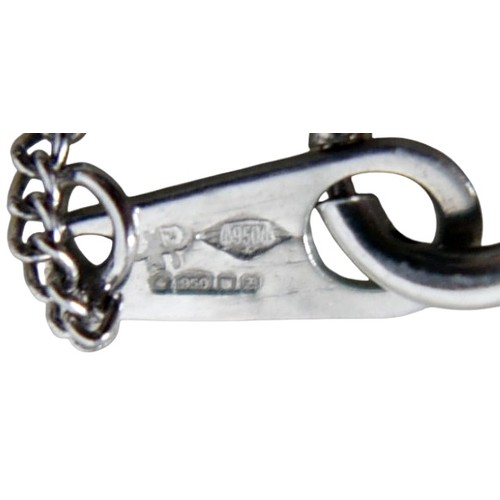 7 - A platinum and diamond pendant, the four briliant cut diamonds in a quatrefoil setting of four petal... 