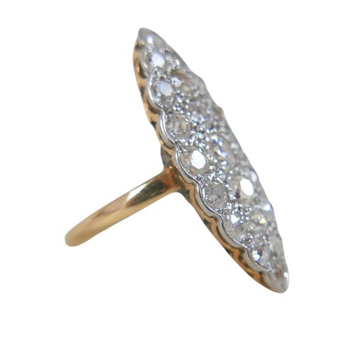 6 - An 18ct gold, platinum and diamond Art Deco ring, circa 1920s, the marquise top section set with 21 ... 