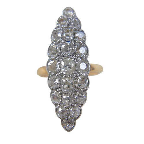 6 - An 18ct gold, platinum and diamond Art Deco ring, circa 1920s, the marquise top section set with 21 ... 