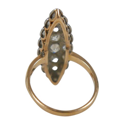 6 - An 18ct gold, platinum and diamond Art Deco ring, circa 1920s, the marquise top section set with 21 ... 