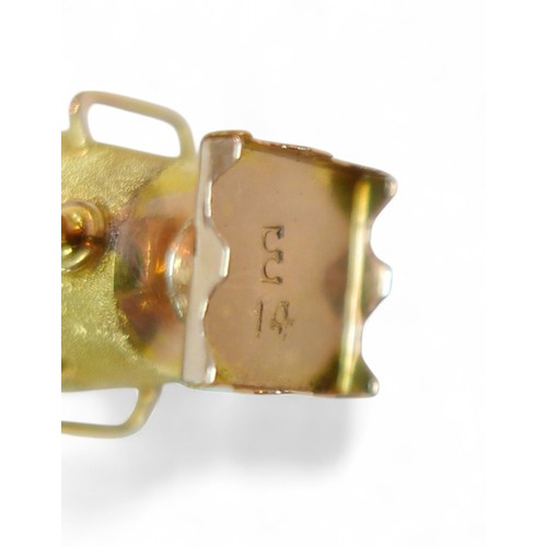 32 - A 14ct gold samovar charm, stamped '14' to its base, 1.1 by 1.3 by 3.1cm high, 3.6g.