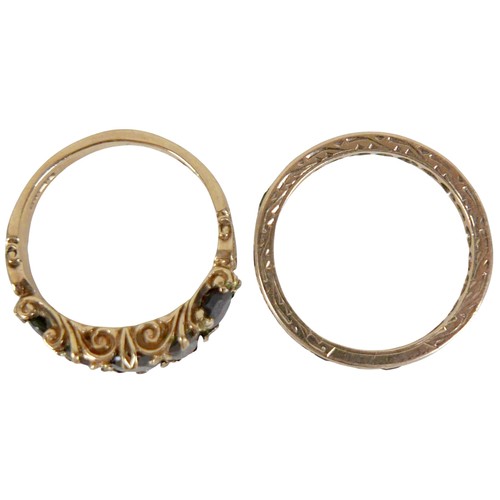 36 - A 9ct gold five stone garnet ring, size N, 3.5g, plus a 9ct eternity ring set with square cut emeral... 