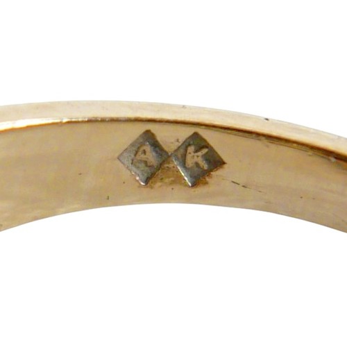 36 - A 9ct gold five stone garnet ring, size N, 3.5g, plus a 9ct eternity ring set with square cut emeral... 