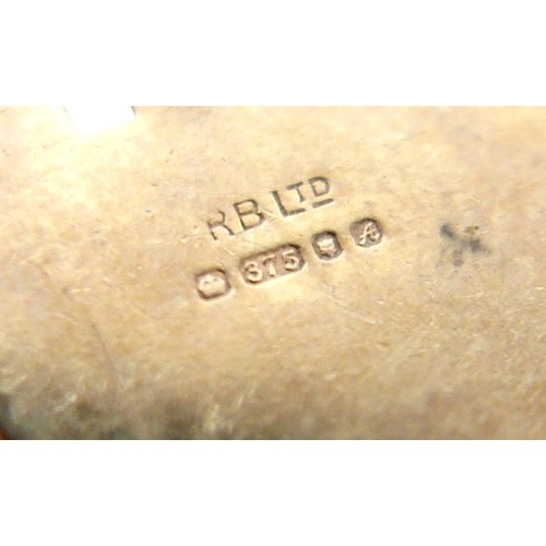 15 - A 9ct gold charm bracelet with heart lock, circular gold Taurus charm, wishbone charm, carriage with... 