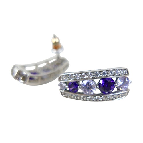 43 - A group of silver jewellery, comprising two dress rings with thick bands; one with 925 silver and pi... 