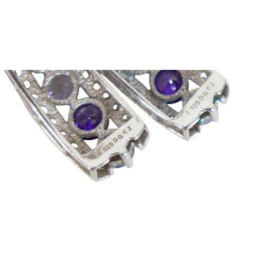 43 - A group of silver jewellery, comprising two dress rings with thick bands; one with 925 silver and pi... 