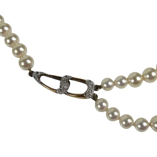 41 - A pearl necklace with silver gilt clasp, three pearl bracelets (one with unmarked gold metal links),... 