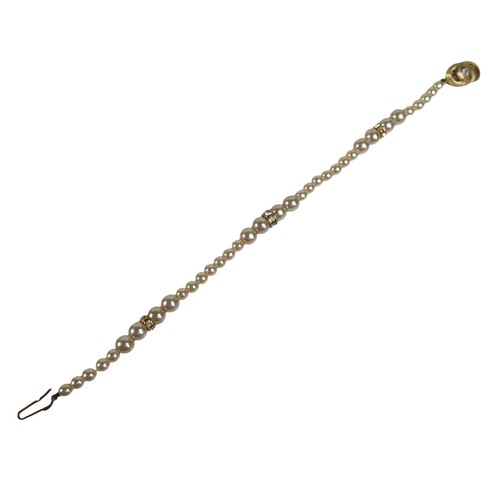 41 - A pearl necklace with silver gilt clasp, three pearl bracelets (one with unmarked gold metal links),... 